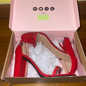 Red heels with clear toe strap
